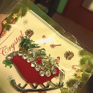 Women's pin red Christmas sled with green Christmas tree in it rhinestone brooch
